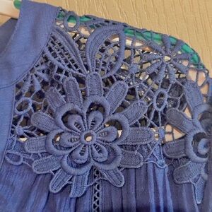 Blue lace trimmed blouse